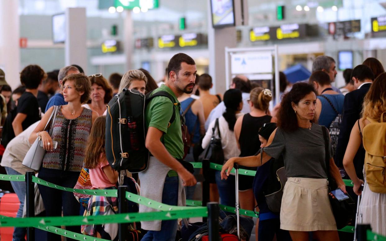 Under the crackdown specially trained security experts hired in from private firms will patrol passenger queues asking people questions about the purpose of their travel - AP