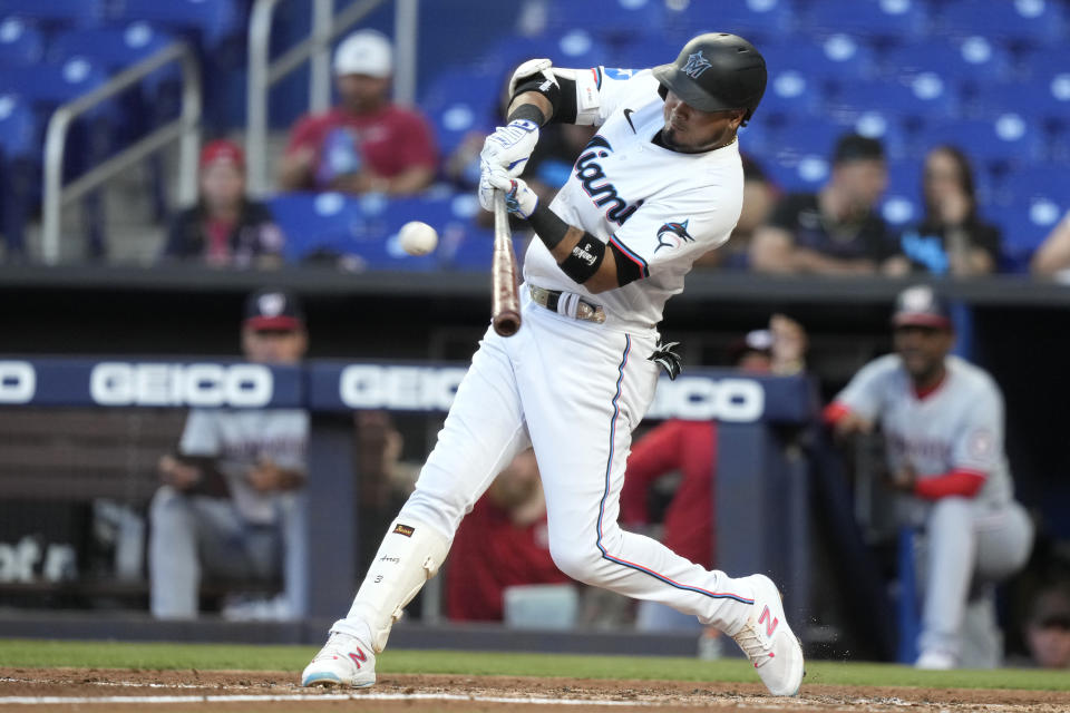 Miami Marlins' Luis Arraez hits a double during the third inning of a baseball game against the Washington Nationals, Monday, April 29, 2024, in Miami. (AP Photo/Lynne Sladky)