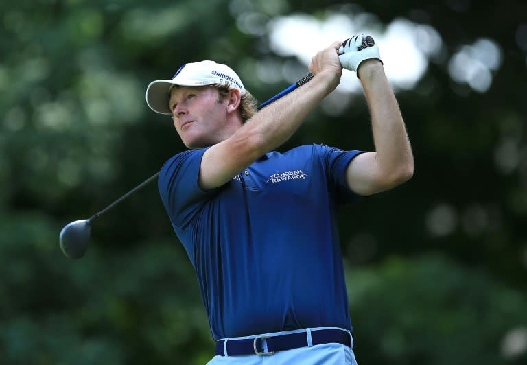 Brandt Snedeker of the US plays his shot from the 11th tee during the third round of the Canadian Open on July 23, 2016 in Oakville, Canada