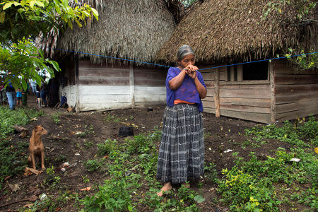 Elvira Choc, 59, grandmother of Jakelin, a 7-year-old girl who died in U.S. custody, stands outside her house in Raxruha, Guatemala December 15, 2018. REUTERS/Josue Decavele