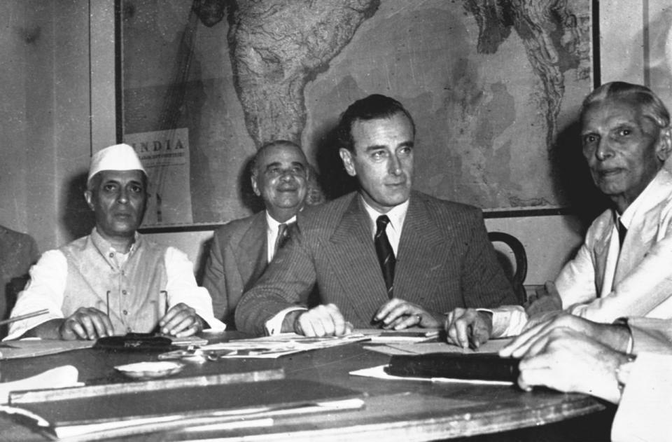 INDIA CONFERENCE: From left, Pandit Jawarharlal Nehru, Vice President of India’s Interim Government, Earl Mountbatten, Viceroy of India and Muhammad Ali Jinnah, President of the Muslim League discuss Britain’s plan for India at the historic India Conference in New Delhi, June 2, 1947. (AP Photo)