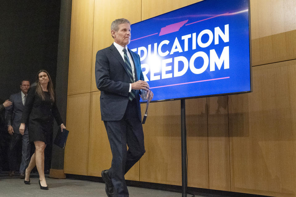 Tennessee Gov. Bill Lee arrives for a news conference to announce the Education Freedom Scholarship Act of 2024, a legislative proposal to establish statewide universal school choice with Arkansas Gov. Sarah Huckabee Sanders, left, Tuesday, Nov. 28, 2023, in Nashville, Tenn. (AP Photo/George Walker IV)