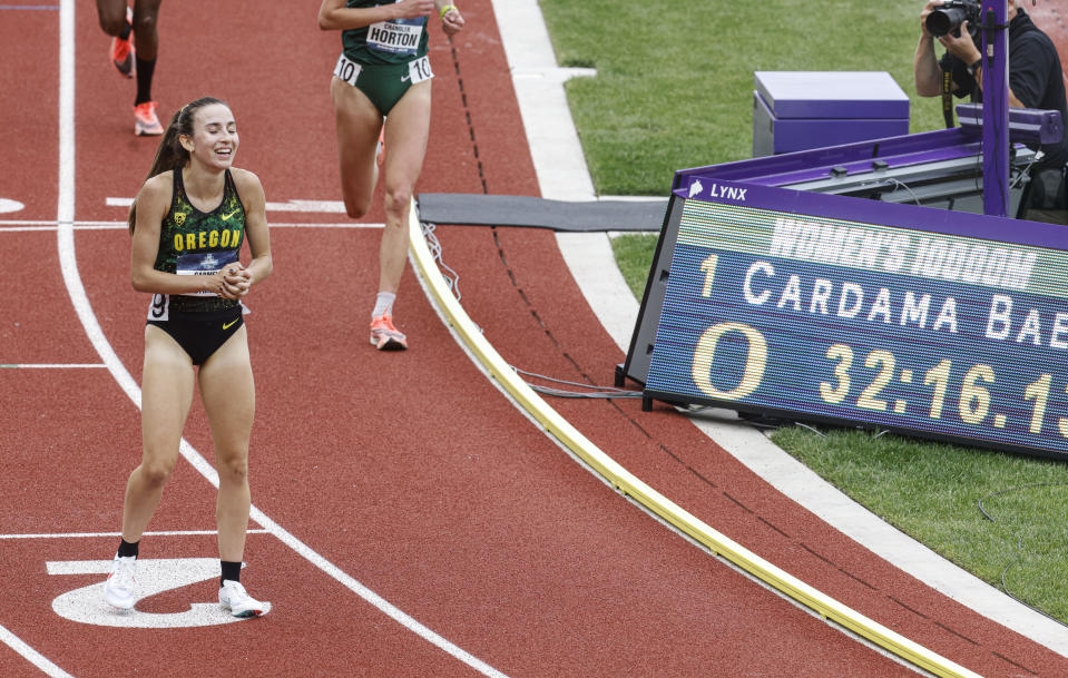 Oregon's Carmela Cardama Baez slows after wining the women's 10,000 meters at the NCAA Division I Outdoor Track and Field Championships, Thursday, June 10, 2021, at Hayward Field in Eugene, Ore. (AP Photo/Thomas Boyd)