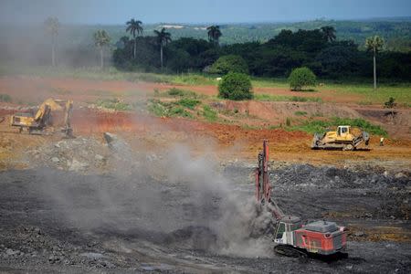 Mining machinery work at an area being prepared to be used by the lead and zinc mine Castellanos in Minas de Matahambre, Cuba, July 20, 2017. REUTERS/Alexandre Meneghini