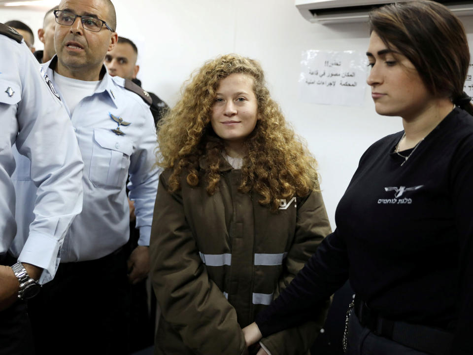 Ahed Tamimi: Palestinian teenager who slapped Israeli soldiers sentenced to eight months in prison under plea bargain