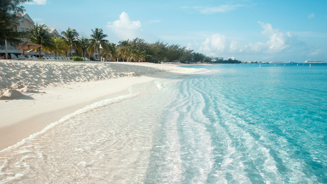 Seven Mile Beach on Grand Cayman Island in the Cayman Islands is one of the tropical destinations that Charlotte travelers can fly to direct from Charlotte Douglas International Airport.