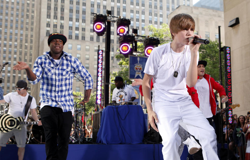 Close-up of Justin as a teen performing onstage