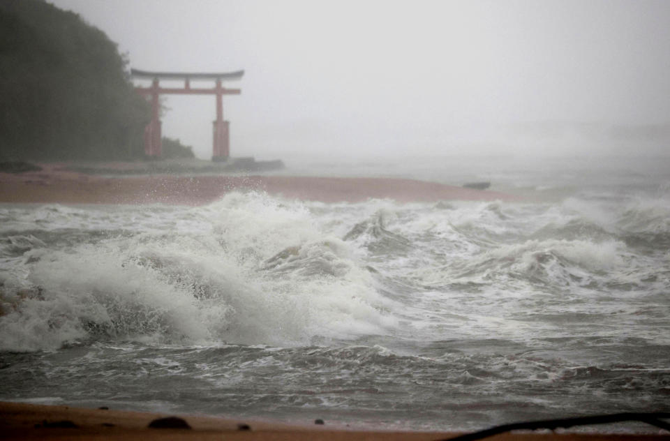 Waves batter the shore in Miyazaki, southern Japan, Sunday, Sept. 18, 2022, as a powerful typhoon approaching southern Japan on Sunday lashed the region with strong winds and heavy rain.(Kyodo News via AP)