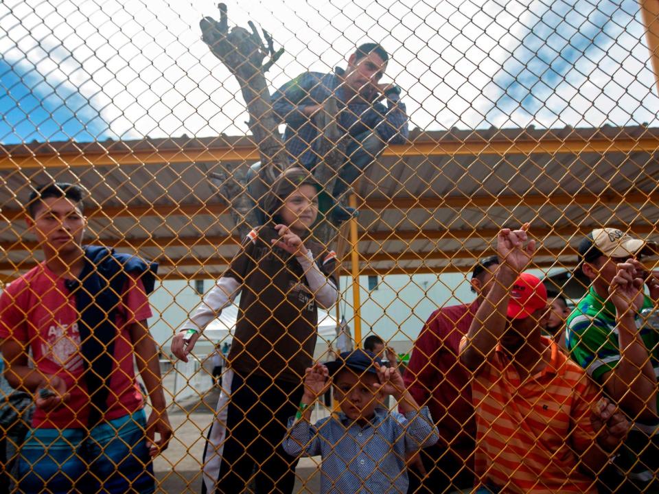 Central American migrants remain at a warehouse used as shelter in Mexico along US border: AFP/Getty Images