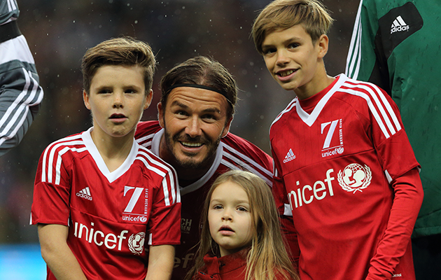 Beckham is dad goals. Photo: Getty