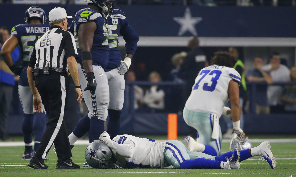 Dallas Cowboys wide receiver Allen Hurns pounds his fist on the ground after breaking his ankle on a pass play in the first half of the NFC wild-card game against the Seattle Seahawks (AP)