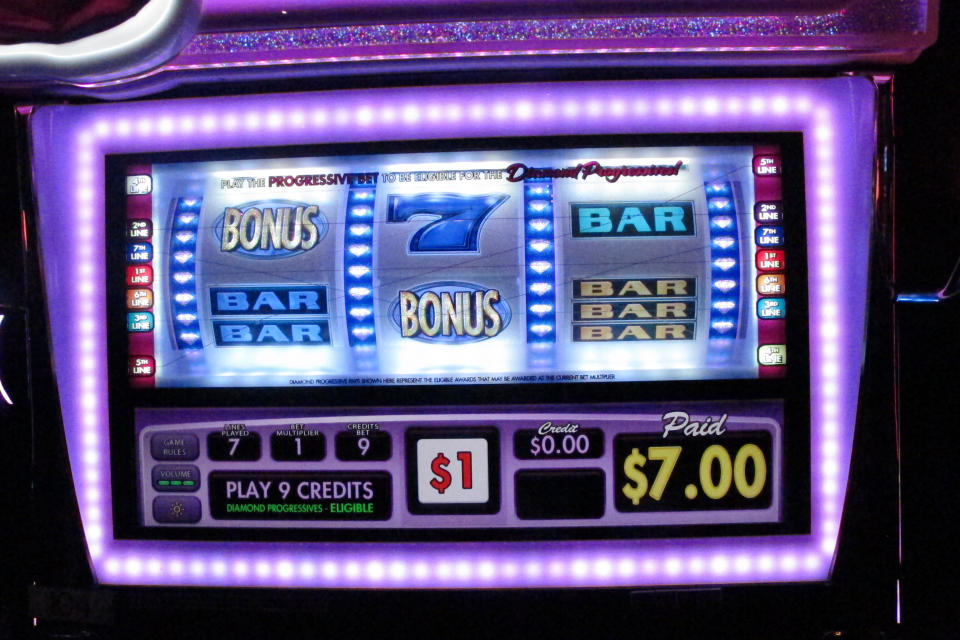 This Oct. 8, 2019 photo, shows the screen of a slot machine at Resorts Casino in Atlantic City, N.J. How frequently slot machine surfaces should be wiped down, and how far apart players should have to be from each other are among the issues casinos are grappling with as they prepare to reopen after being shut down due to the coronavirus outbreak. (AP Photo/Wayne Parry)