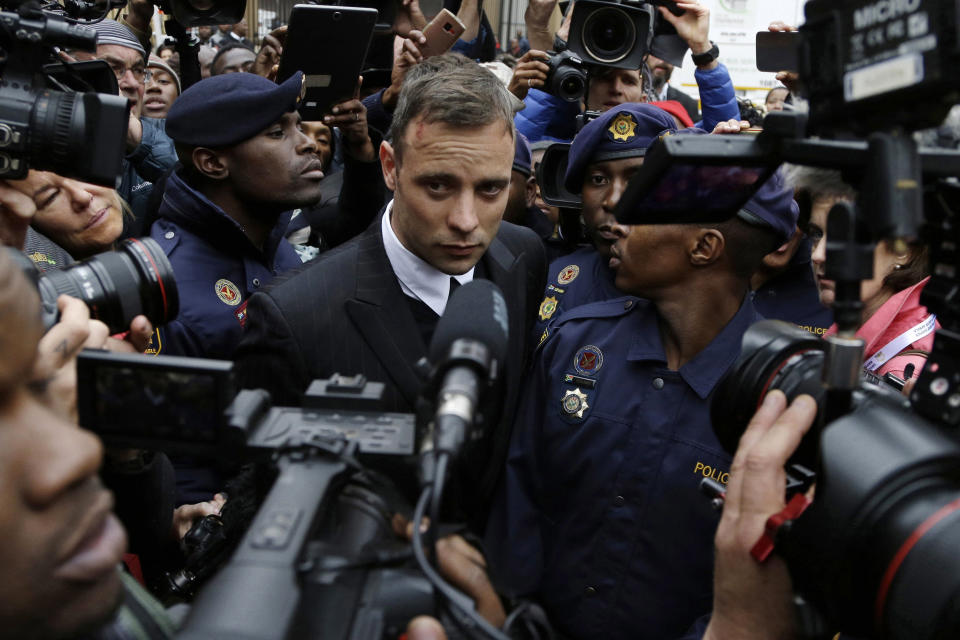 FILE - Oscar Pistorius leaves the High Court in Pretoria, South Africa, on June 14, 2016 during his trail for the murder of girlfriend Reeva Steenkamp. Oscar Pistorius is due on Friday, Jan. 5, 2024 to be released from prison on parole to live under strict conditions at a family home after serving nearly nine years of his murder sentence for the shooting death of girlfriend Reeva Steenkamp on Valentine’s Day 2013. (AP Photo/Themba Hadebe, File)