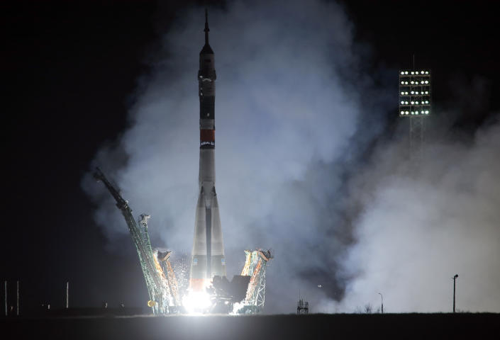 The Soyuz-FG rocket booster with Soyuz MS-12 space ship carrying a new crew to the International Space Station, ISS, blasts off at the Russian leased Baikonur cosmodrome, Kazakhstan, early Friday, March 15, 2019. The Russian rocket carries U.S. astronauts Christina Hammock Koch, Nick Hague, and Russian cosmonaut Alexey Ovchinin. (AP Photo/Dmitri Lovetsky)