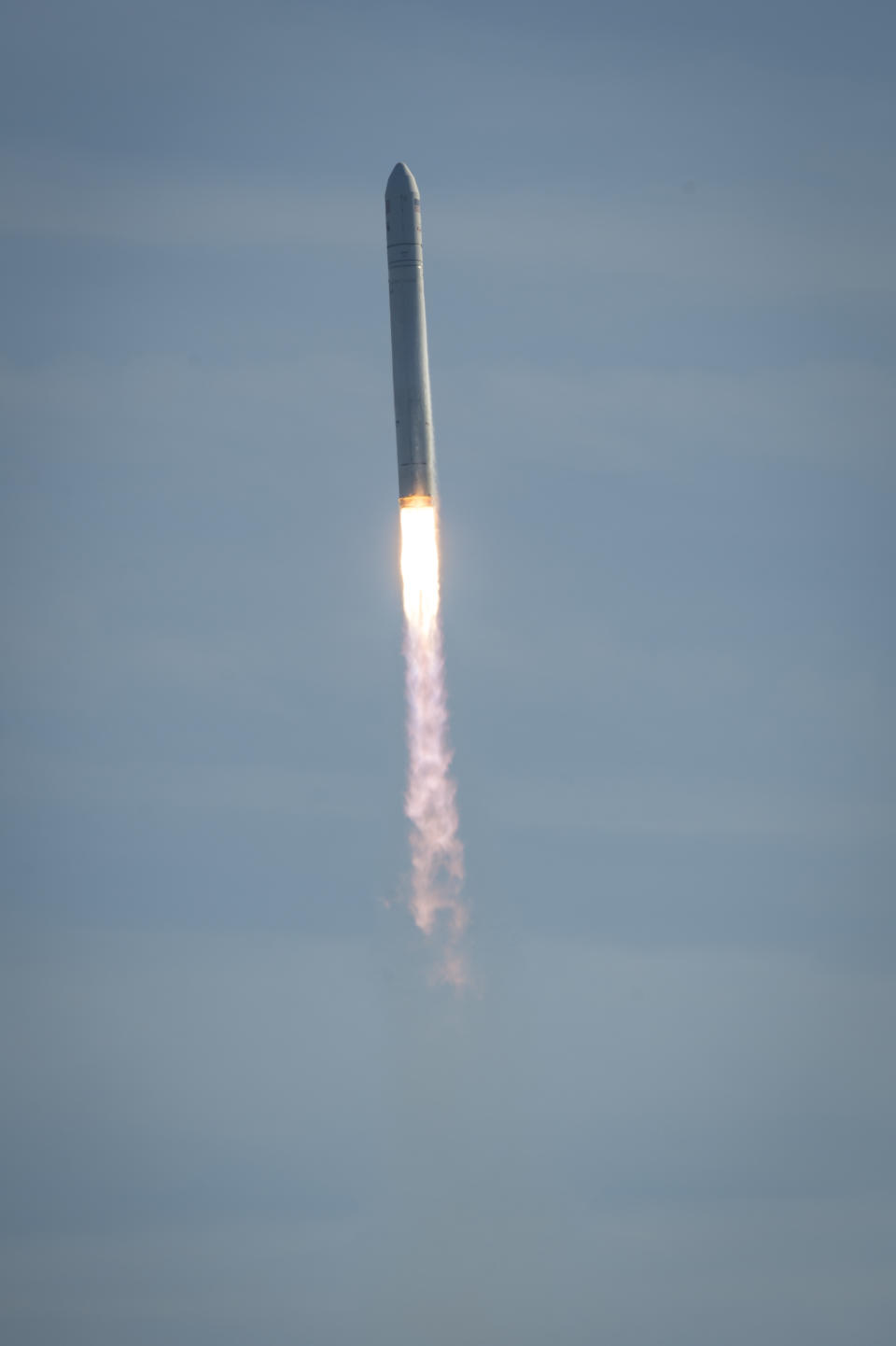 An Orbital Sciences Corporation Antares rocket launches at NASA's Wallops Flight Facility, Thursday, Jan. 9, 2014, in Wallops Island, Va. Orbital Sciences Corp. launched its unmanned Antares rocket packed with 3,000 pounds of equipment and experiments provided by NASA, as well as food and even some ants for an educational project. Christmas presents also are on board for the six space station residents; the delivery is a month late following a series of delays. (AP Photo/NASA, Bill Ingalls)