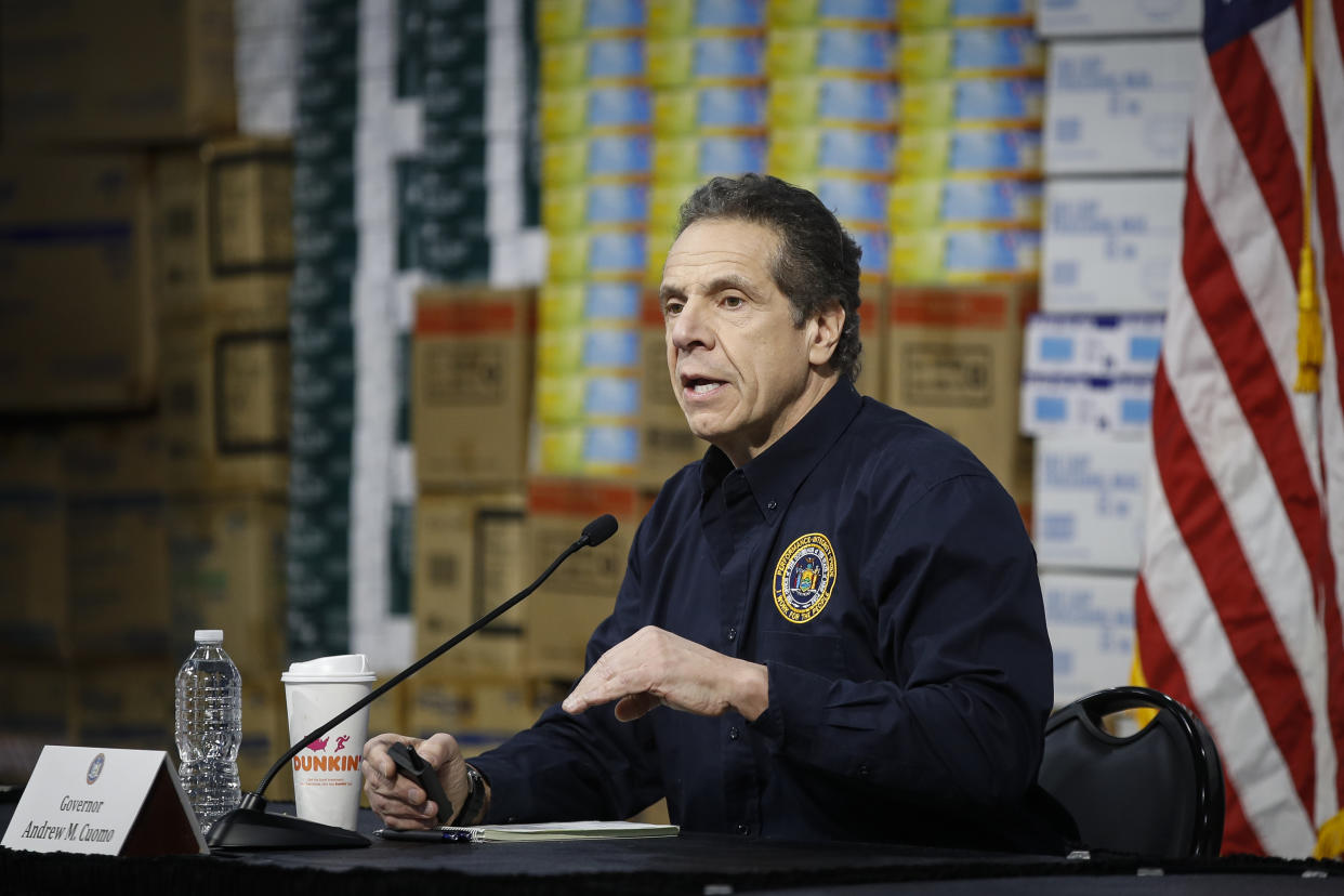 New York Gov. Andrew Cuomo speaks during a news conference at the Jacob Javits Center that will house a temporary hospital in response to the COVID-19 outbreak, Tuesday, March 24, 2020, in New York. (AP Photo/John Minchillo)