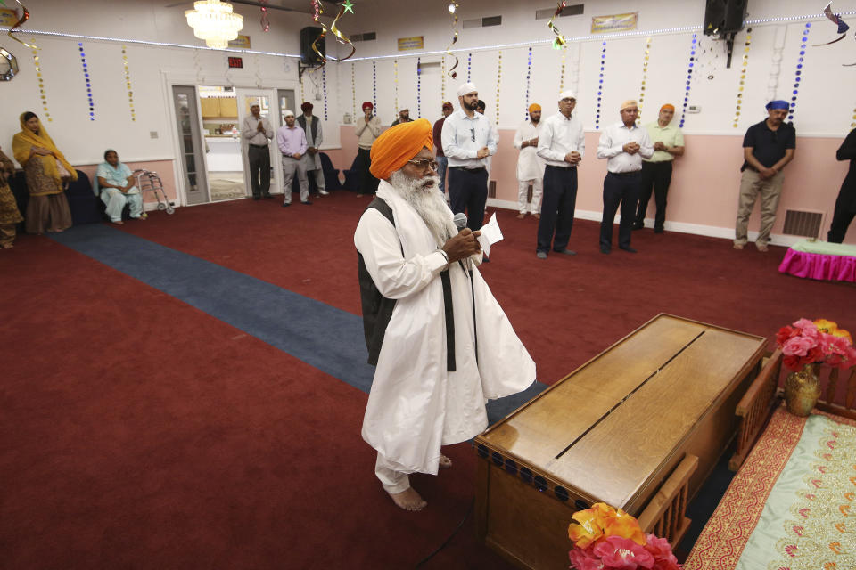 ***HOLD FOR RELIGION TEAM STORY*** Priest (Bhai) Ram Singh is shown performing rituals during the Shri Guru Ravidass Sabha ceremony at a temple in Fresno, Calif. Sunday, May 7, 2023. Members of the Ravidassia community in California are followers of Guru Ravidass, a 14th century Indian guru of a caste formerly considered untouchable. The Ravidassia community statewide is advocating for new legislation to outlaw caste-based discrimination. (AP Photo/Gary Kazanjian)