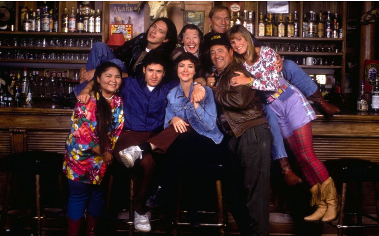 Barry Corbin (center right) with the cast of <em>Northern Exposure</em>. Photo courtesy of imdb.com.