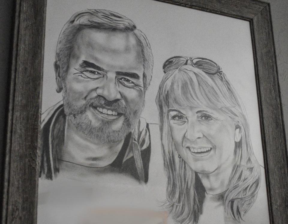 Although Carlos Ollervides has been drawing portraits since he was in third grade at St. Mary’s School, this recently finished drawing of him and his wife, Debi, is his first self-portrait.