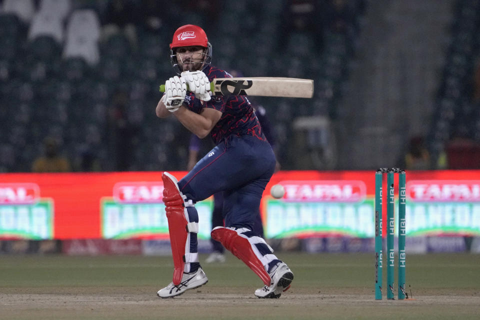 Islamabad United' Salman Ali Agha plays a shot during the Pakistan Super League T20 cricket match between Islamabad United and Quetta Gladiators, in Lahore, Pakistan Thursday, Feb. 22, 2024. (AP Photo/K.M. Chaudary)