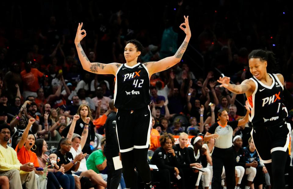 Phoenix Mercury center Brittney Griner (42) reacts after making a three-pointer during the home opener against the Chicago Sky in the second half at Footprint Center on May 21, 2023.