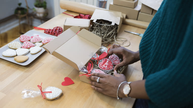 Packaging up heart-shaped cookies