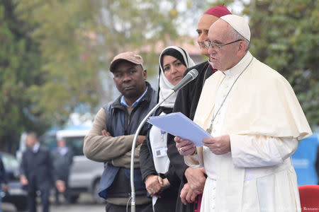 Pope Francis speaks as he visits a migrant's reception centre during a pastoral visit in Bologna, Italy October 1, 2017. Osservatore Romano/Handout via Reuters