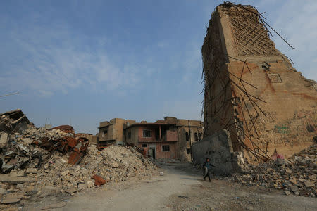 The destroyed al-Hadba minaret at the Grand al-Nuri Mosque is seen in the old city of Mosul, Iraq January 17, 2018. REUTERS/Ari Jalal/Files