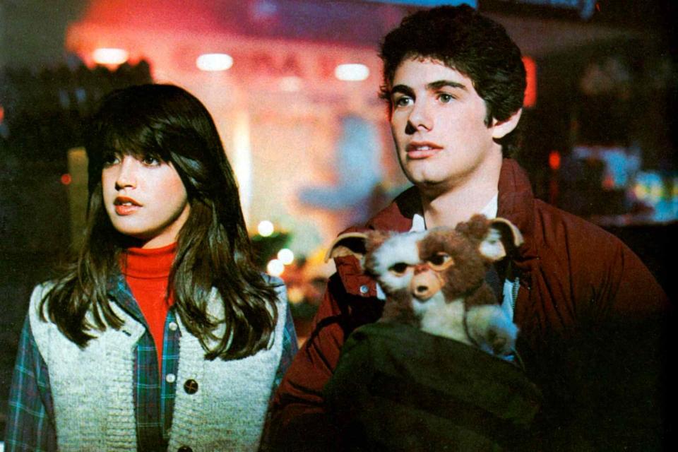 <p>Warner Bros. Pictures/Amblin E/Sunset Boulevard/Corbis via Gett</p> Phoebe Cates and Zach Galligan in 