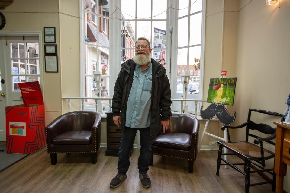 Daniel Hartsfield stands inside barbershop, Daniel's Barber Shop on the Square, in Columbia, Tenn., on Friday, Jan. 28, 2022.