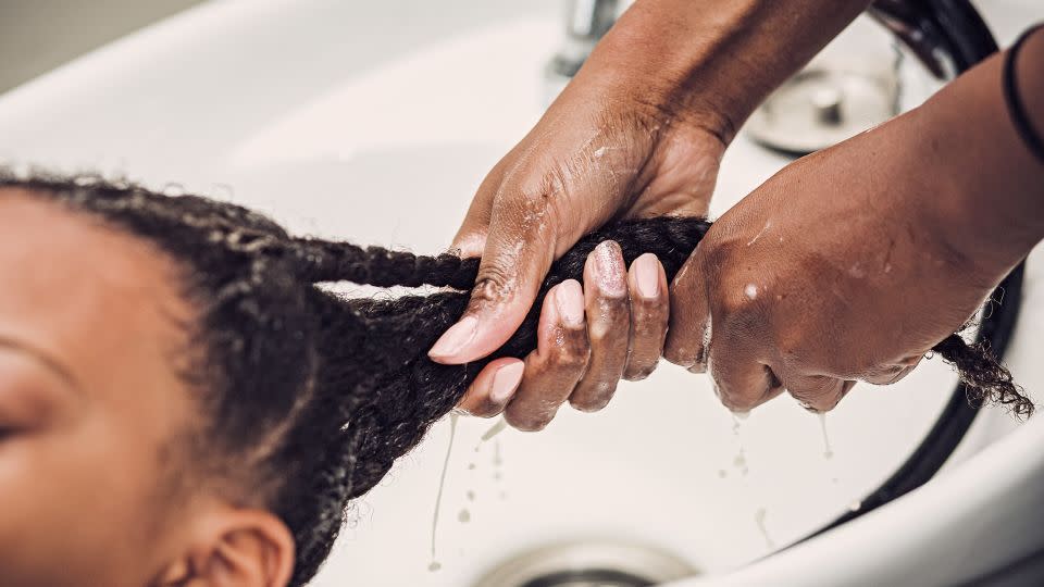 One mother, Kameron, taught Faxio a game-changing wash day "hack" — "detangling then braiding (or twisting) hair before washing it to reduce tangling," she writes. - Tomesha Faxio