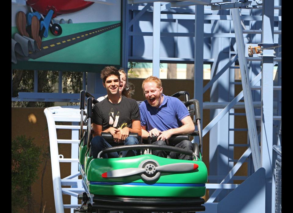 'Modern Family' star Jesse Tyler Ferguson celebrates his recent Emmy nomination with Justin Mikita and Mikita's niece Emma and nephew Will at the new 'Goofy's Sky School' attraction at Disney California Adventure on July 15, 2011 in Anaheim, California.   (Photo by Paul Hiffmeyer/Disney Parks via Getty Images)