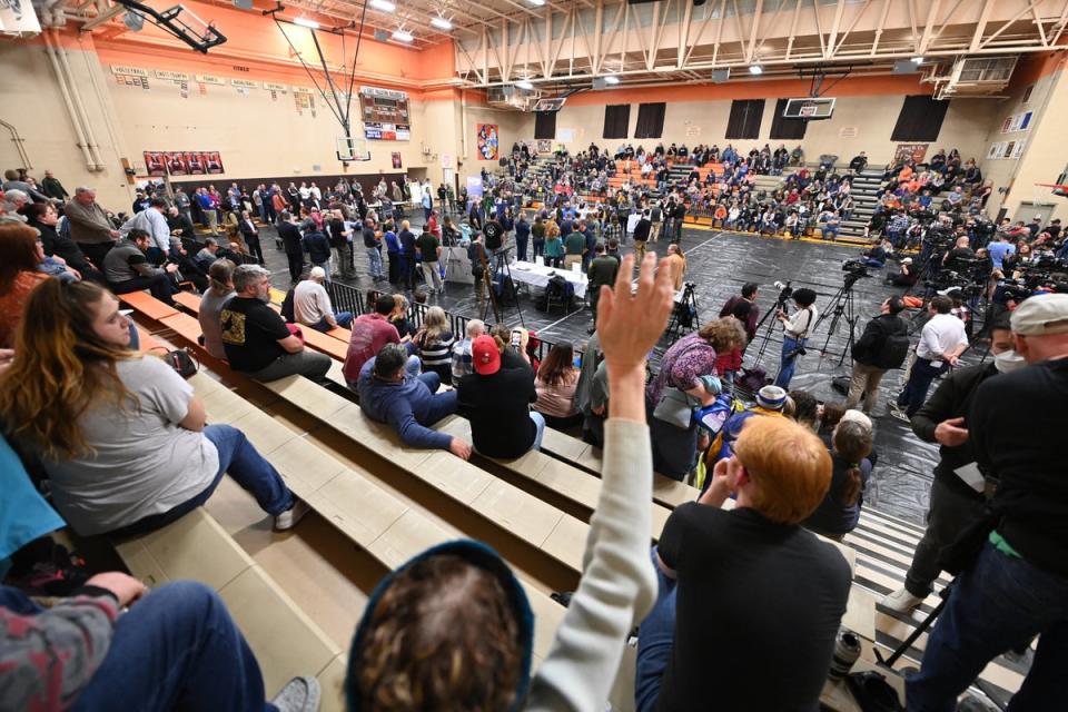 Members of the community gather to discuss their safety and other environmental concerns at a town hall meeting following a train derailment that spilled toxic chemicals, in East Palestine (REUTERS)