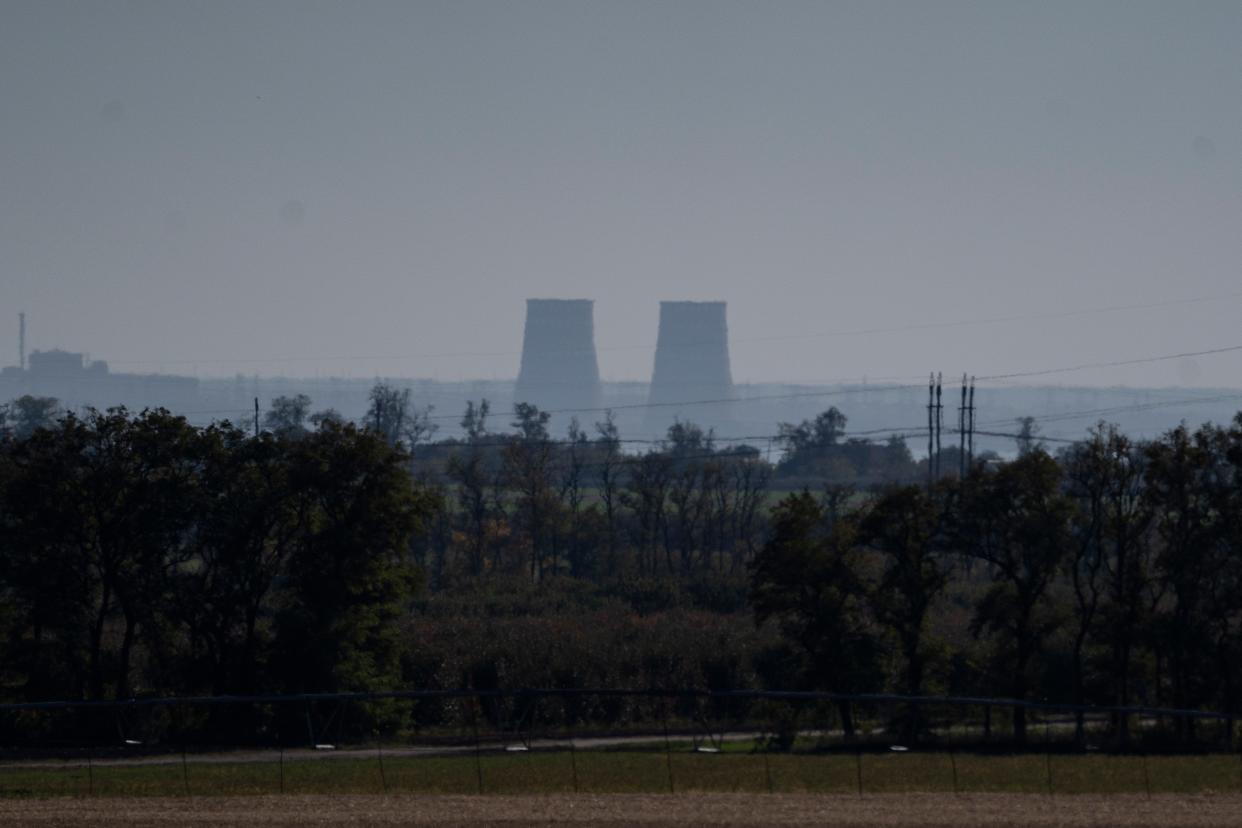 Zaporizhzhia nuclear power plant is seen from around 20km away in an area in the Dnipropetrovsk region (AP Photo/Leo Correa)