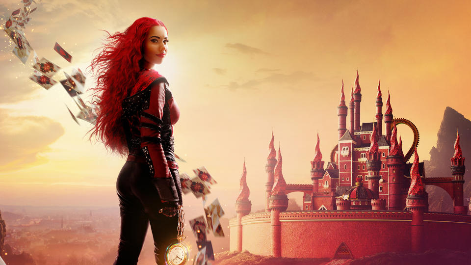 A screenshot of the official poster for Disney Plus film original Descendants: The Rise of Red, which shows the main character looking over her shoulder into the camera