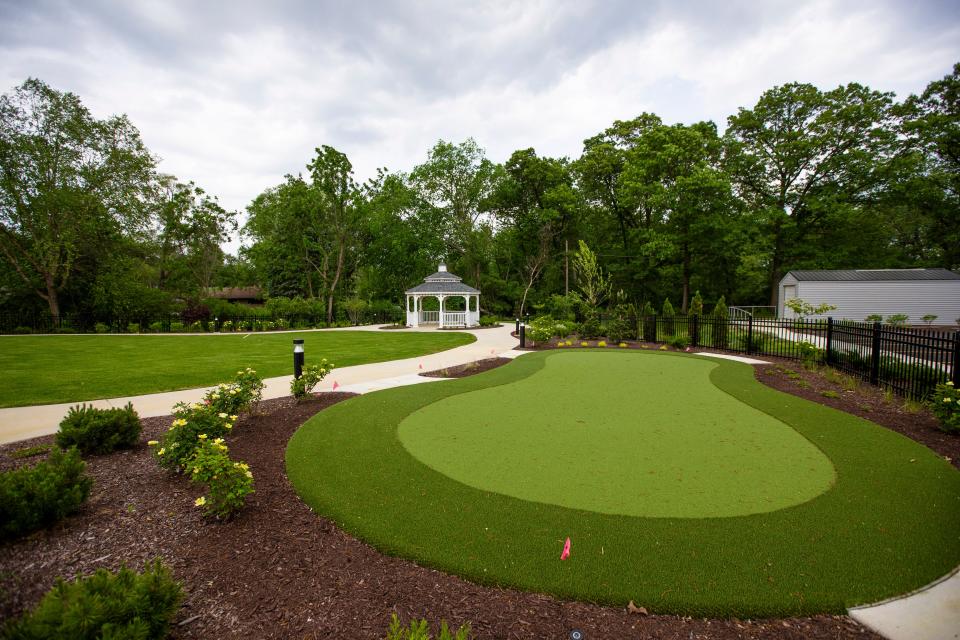 A putting green is part of the courtyard space at the new Milton Village in South Bend, as seen on Tuesday, May 31, 2022,