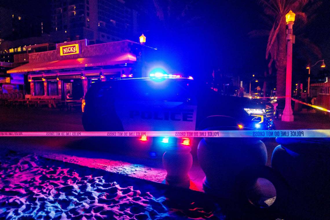 A Hollywood Police Car sits parked on the 1214 block of North Broadwalk near Nick’s Bar and Grill after police responded to reports of multiple people shot during Memorial Day weekend at Hollywood, Florida, on Monday, May 29, 2023.