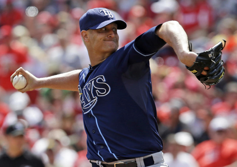 Tampa Bay Rays starting pitcher Alex Cobb throws against the Cincinnati Reds in the sixth inning of a baseball game, Saturday, April 12, 2014, in Cincinnati. Cobb pitched seven shutout innings to earn the 1-0 win. (AP Photo/Al Behrman)