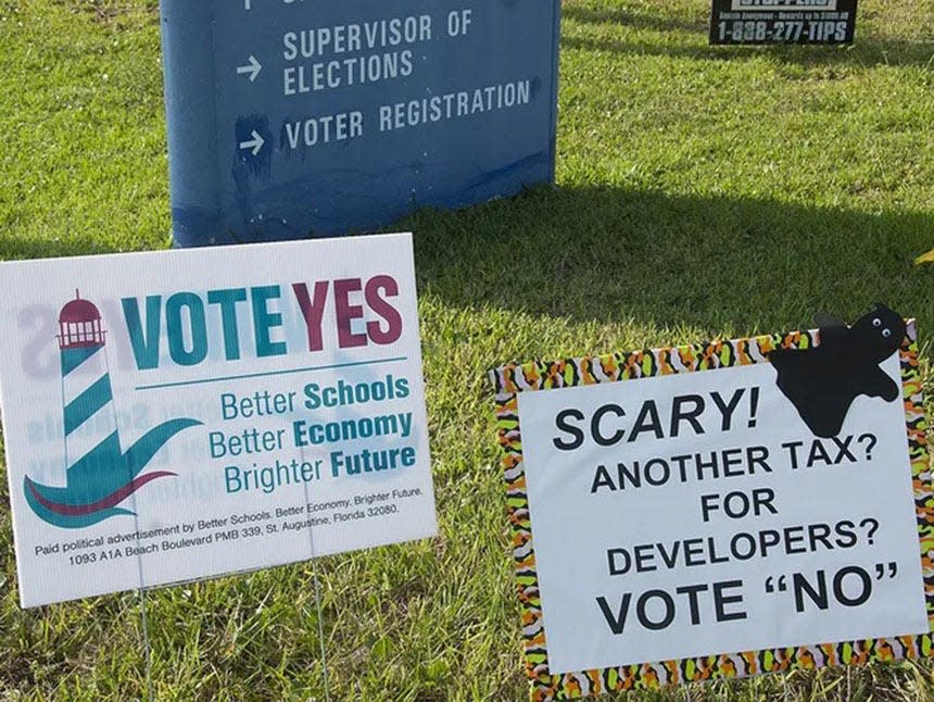 Signs for and against the half-cent sales tax referndum are posted in front of the St. Johns County Supervisor of Elections office. With 60.81 percent of the vote in 2015, St. Johns County voters approved a half-cent sales tax increase to fund projects in new construction, reconstruction, improvement of existing school facilities, safety and security improvements and technology upgrades.