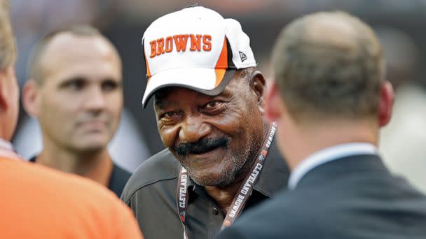 PHOTO: In this Thursday, Aug. 8, 2013 file photo, Hall of Fame running back Jim Brown visits on the sidelines before a preseason NFL football game between the St. Louis Rams and Cleveland Browns in Cleveland. (Mark Duncan/AP, FILE)