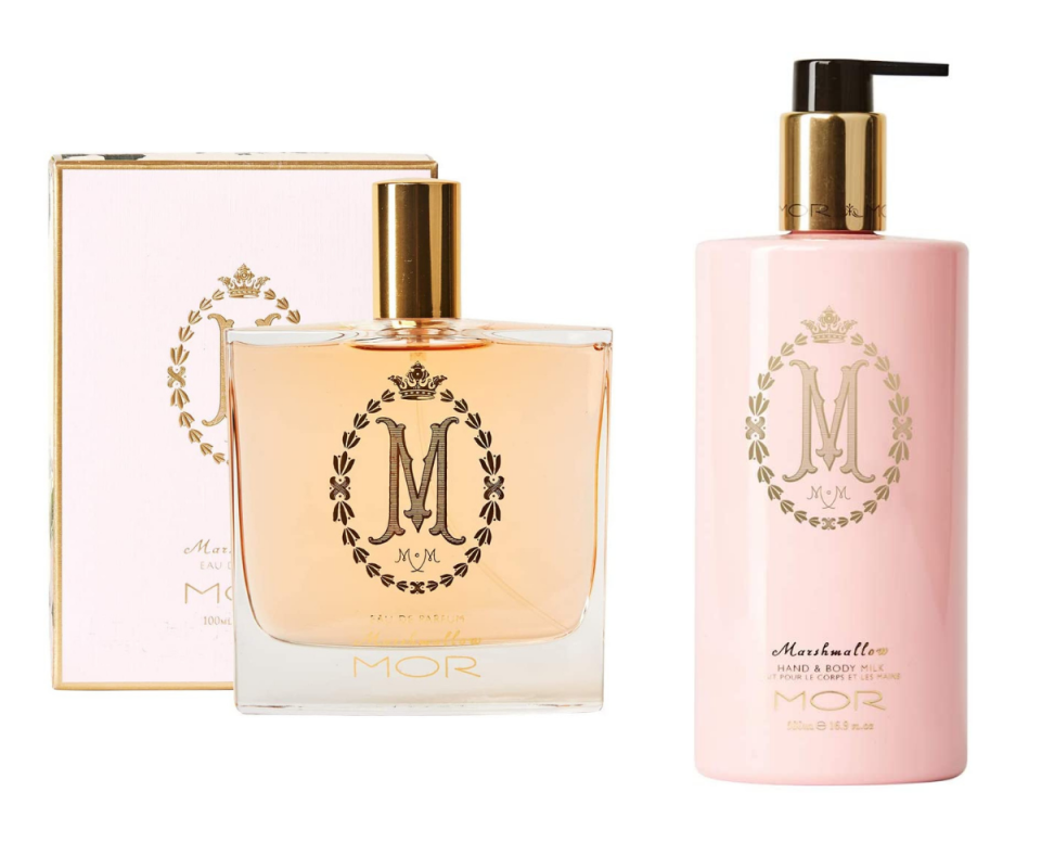 MOR Boutique's Marshmallow Eau de Parfum on the left with the peach glass bottle infront of the pale pink box, next to a pale pink lotion bottle against a white backgoround. 