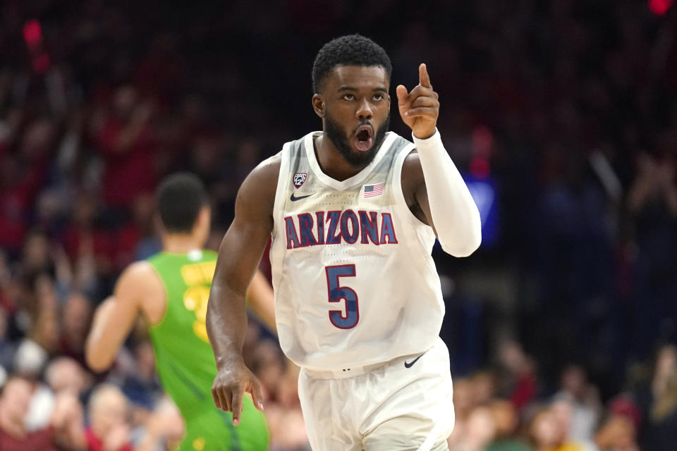 Arizona guard Max Hazzard (5) reacts after scoring a basket against Oregon during the first half of an NCAA college basketball game Saturday, Feb. 22, 2020, in Tucson, Ariz. (AP Photo/Rick Scuteri)