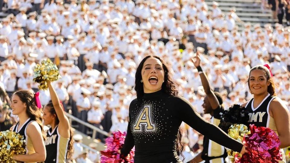 Army Football takes on the University of Massachusetts Minutemen for family weekend at Michie Stadium in West Point, NY. Oct. 28, 2023. Cadet Bridget Konopa, center, was the 2023 captain of the Rabble Rousers cheerleading team. (Cadet Tatum Paullus/Army)