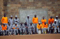 <p>Kenyan prisoners watch a mock World Cup soccer match between Russia and Saudi Arabia as part of a monthlong soccer tournament at the Kamiti Maximum Security Prison, Kenya’s largest prison facility, near Nairobi, on June 14, 2018. (Photo: Baz Ratner/Reuters) </p>