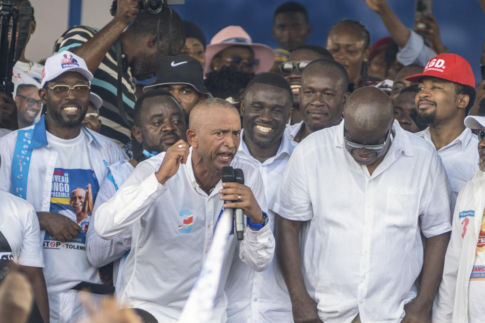 Leading opposition candidate Moise Katumbi, a millionaire businessman, adresses supporters at a rally in Kinshasa, Democratic Republic of the Congo, Saturday, Dec. 9, 2023. Katumbi, the former governor of the rich mining province of Katanga, already has received endorsements from four other candidates who dropped out of the race. But there are still fears that a divided opposition could essentially hand incumbent President Felix Tshisekedi a second term. (AP Photo/Samy Ntumba Shambuyi)