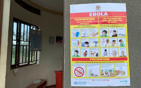 An Ebola-prevention information sign at the Ndaiga Health Centre II, near the shores of Lake Albert and the border with Congo, in Kagadi district, western Uganda - Credit: Ben Wise&nbsp;/International Rescue Committee&nbsp;