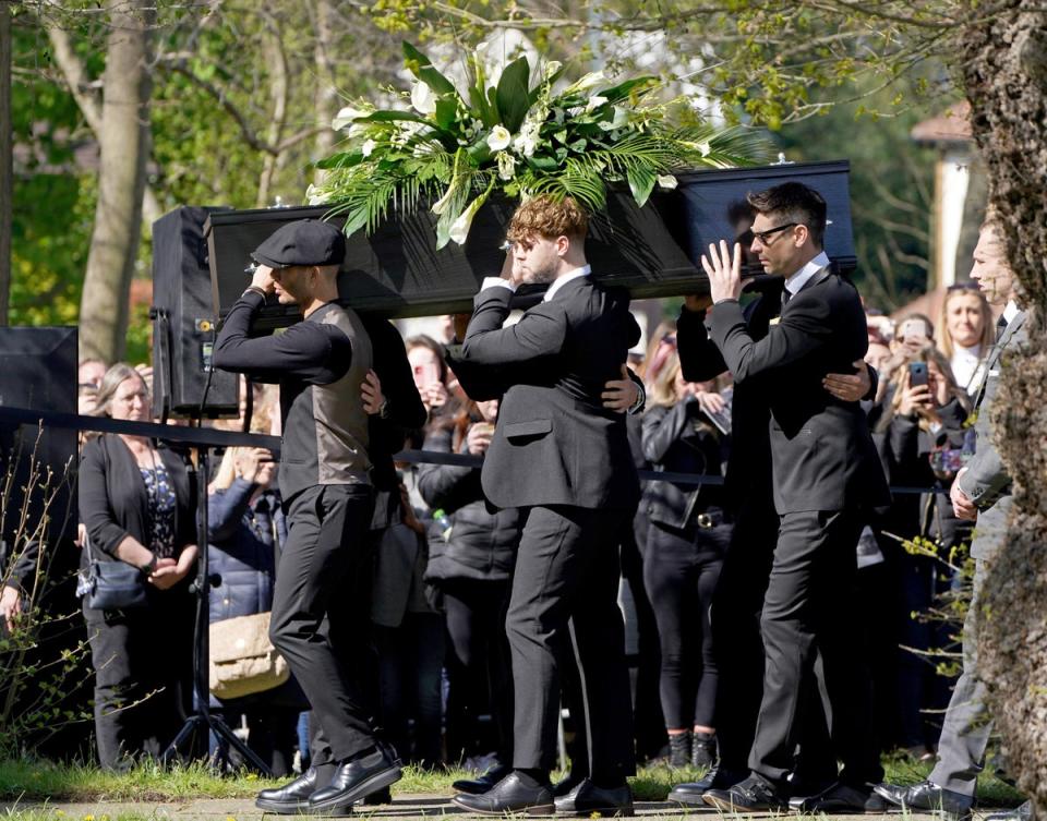 Tom Parker funeral: Max George (left) and Jay McGuiness of The Wanted (centre) carry the coffin at the funeral of their bandmate Tom Parker at St Francis of Assisi church in Queensway, Petts Wood (PA)