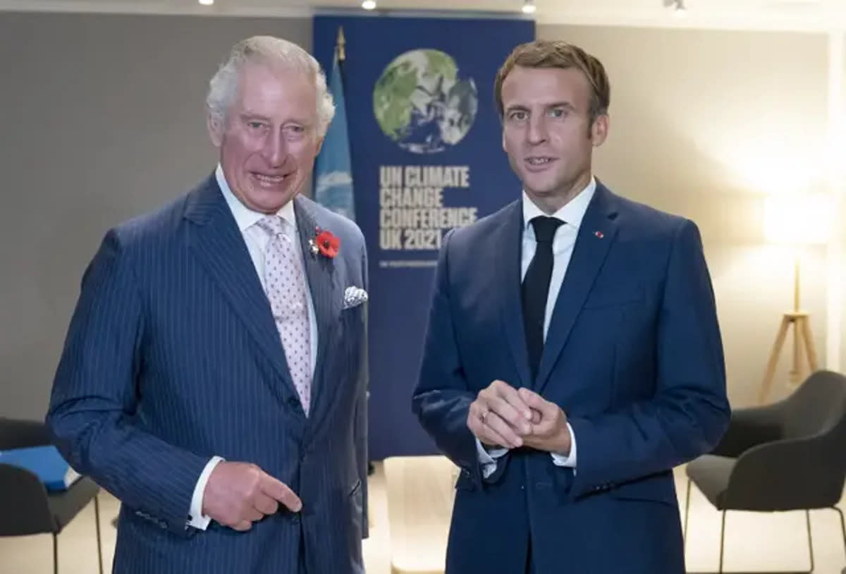 King Charles, then Prince of Wales, greeting the President of France Emmanuel Macron (right) in 2021 (PA)