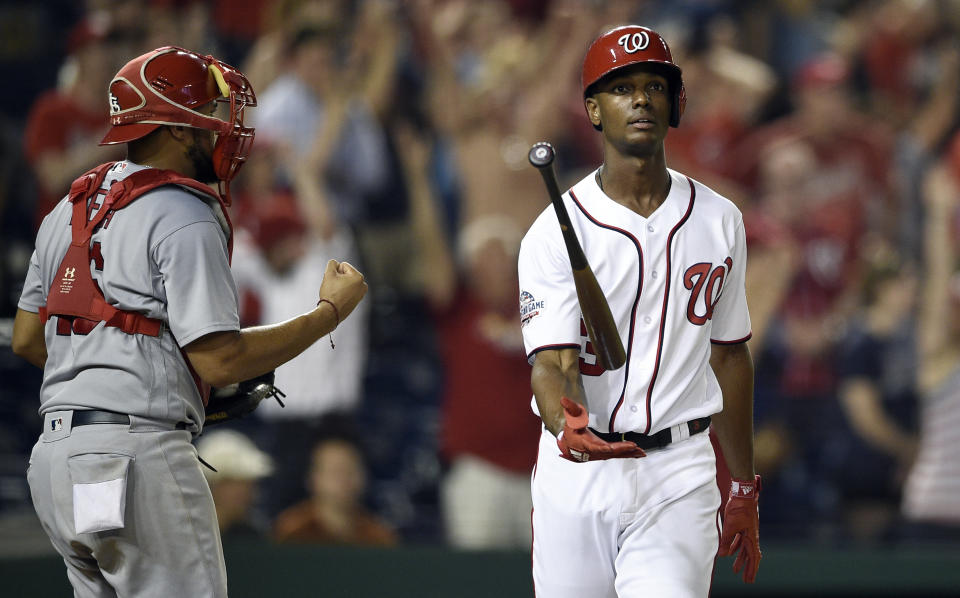 FILE - In this Sept. 5, 2018, file photo, Washington Nationals' Michael Taylor reacts after he struck to to end the baseball game as St. Louis Cardinals catcher Francisco Pena (46) pumps his fist in Washington. Washington defeated Taylor in the first salary arbitration decision this year. Taylor will receive the team's offer of $3.25 million rather than his request of $3.5 million, Friday, Feb. 1, 2019. (AP Photo/Nick Wass, File)