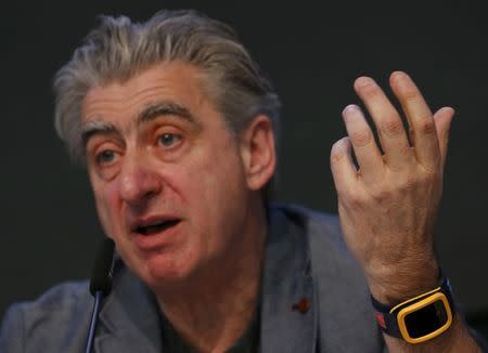 Swatch Group CEO Nick Hayek wears the new 'Swatch Touch Zero One' during the Swiss watchmaker's annual news conference in Corgemont March 12, 2015. REUTERS/Denis Balibouse